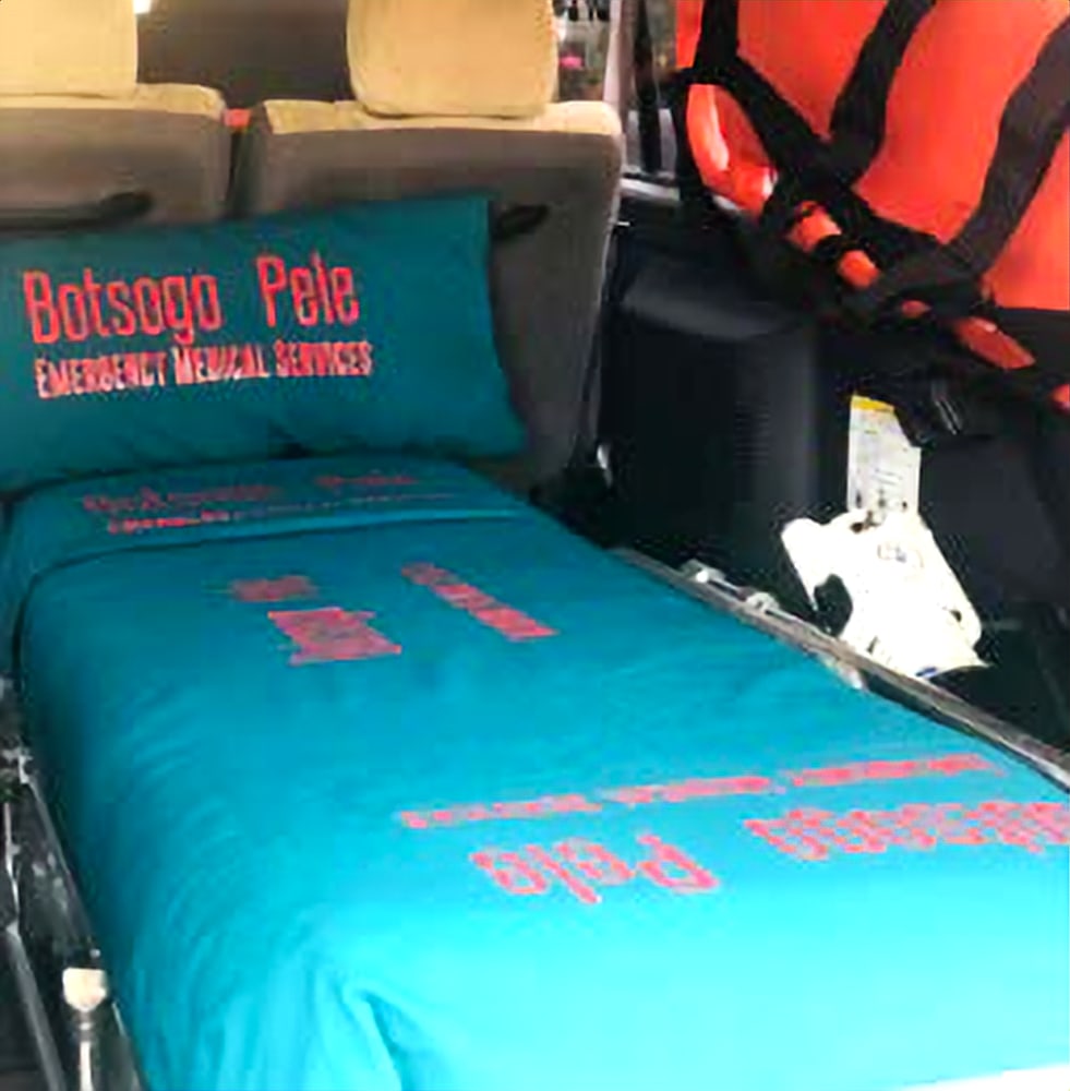 Branded Botsogo Pele stretcher inside the ambulance